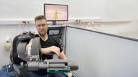 In the picture, one of the creators of the solution is Piotr Falkowski with a prototype exoskeleton worn on his arm