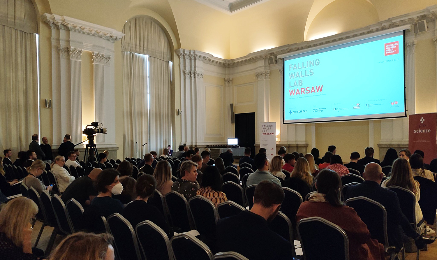 Photo of the Small Hall of our Main Building filled with people