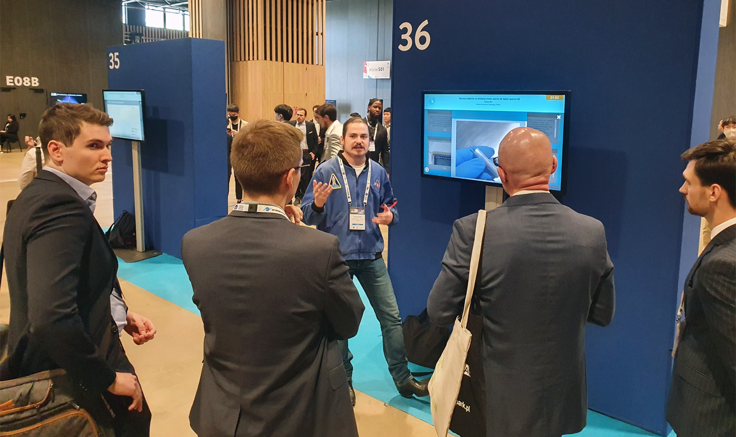 Photo of Tomasz Miś presenting one of the topics during the International Astronautical Congress