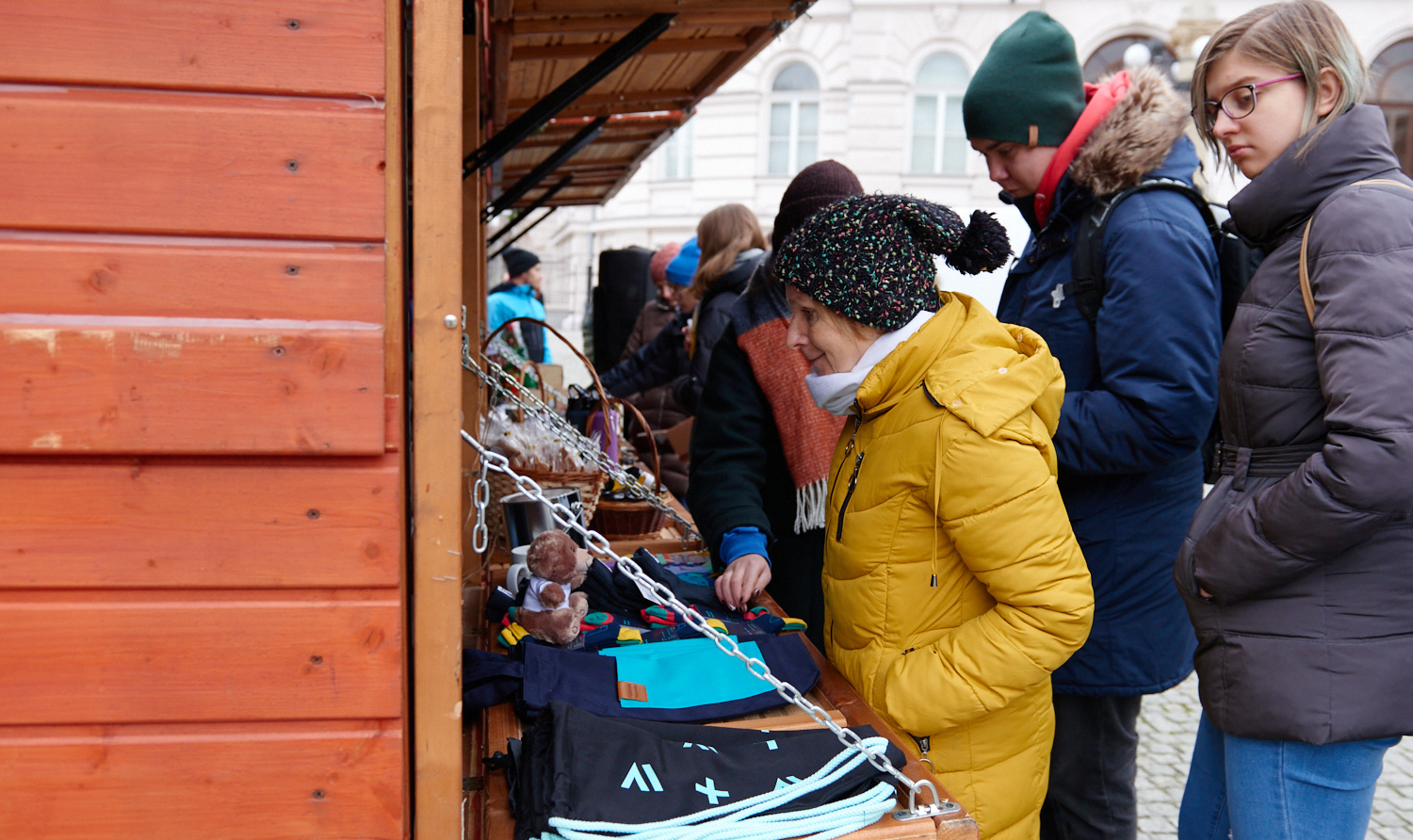 Photo of people standing by the WUT Xmas stall