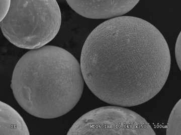 ZrCuAlNbW metallic glass powder particle and NiMnGa magnetocaloric alloy particle