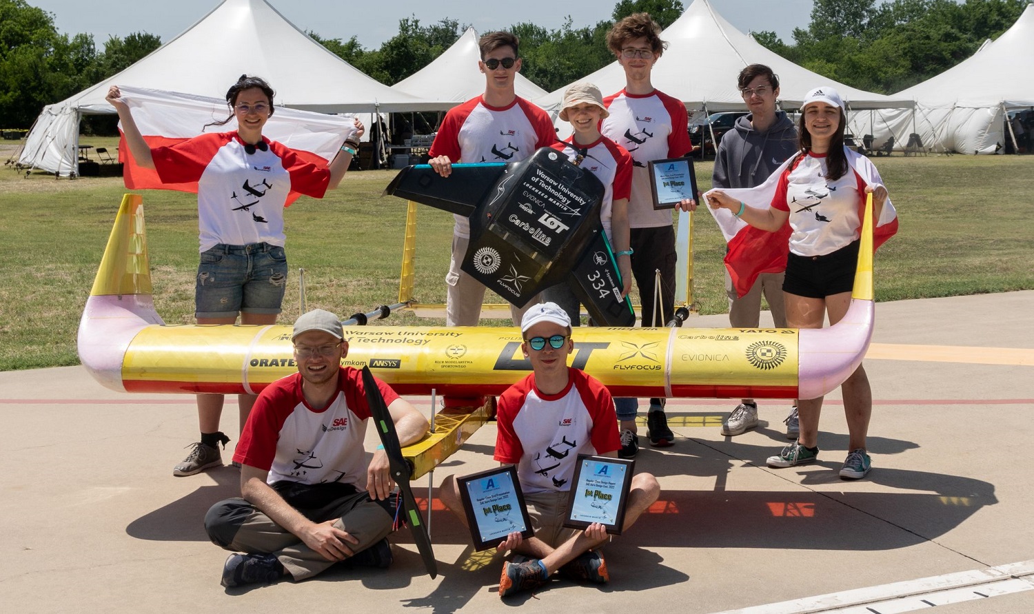 Photo of the students, their aircraft and awards