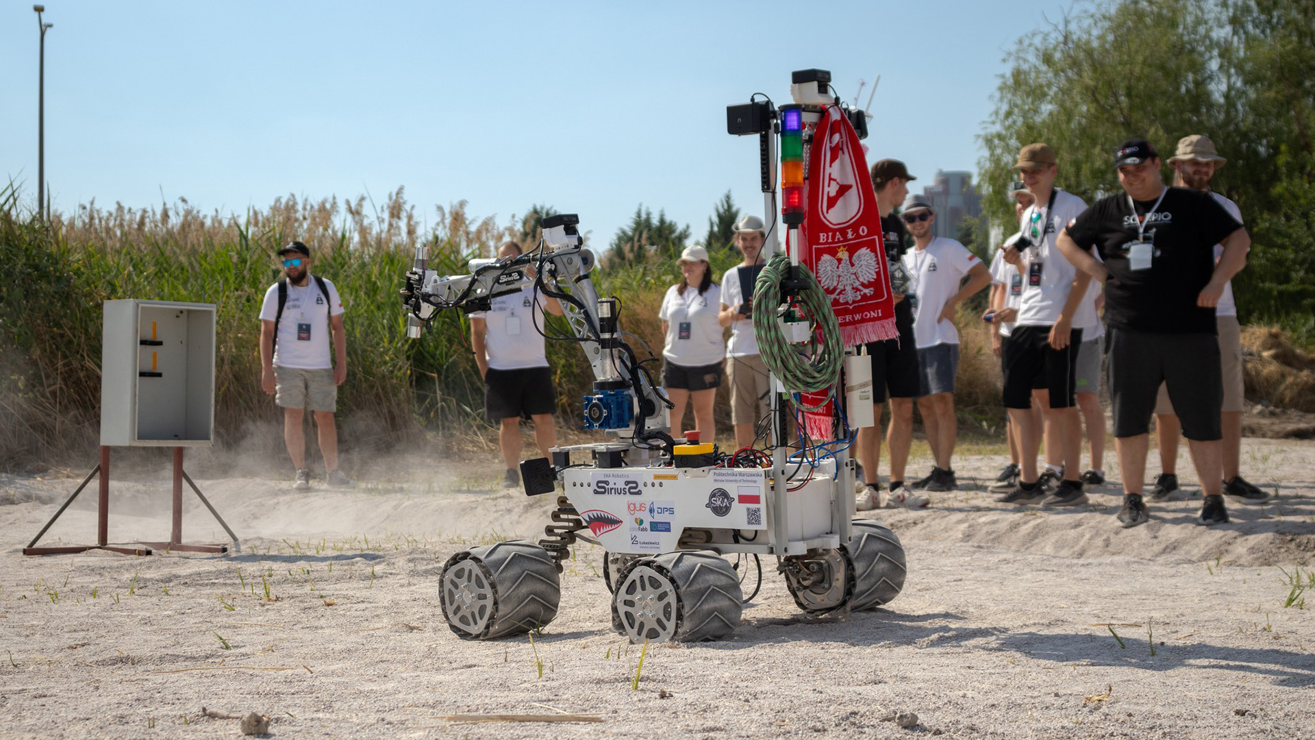 SKA Robotics members and their rover during the Anatolian Rover Challenge
