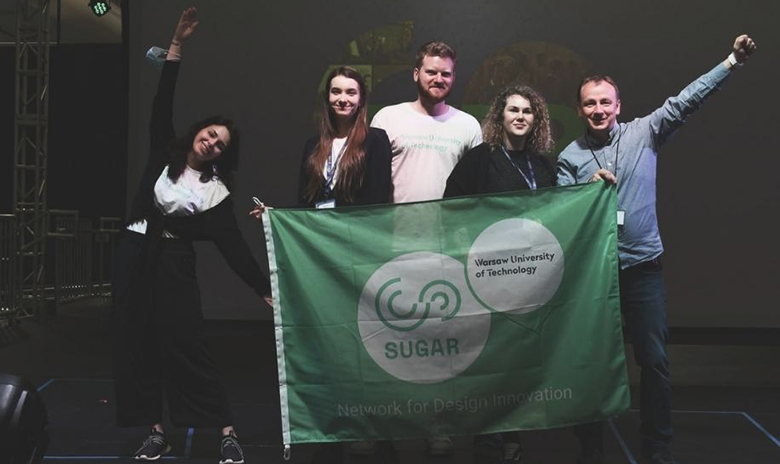 Photo of the developers of the app A’RENT with Professor Mariusz Kaleta