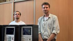 In the photo: Aleksander Mazur and Konrad Łącki at the quantum workstation