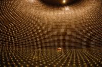 The inside of the Super-Kamiokande detector filled with ultrapure water, photo: the T2K experiment, http://t2k-experiment.org