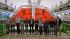 In the photo: scientists from Warsaw University of Technology in front of the ALICE detector.