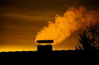 Photo of a roof and smoke