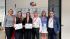 In the photo, there are six people, including two female students from Warsaw University of Technology who were awarded in the "Become an Ambassador" competition.