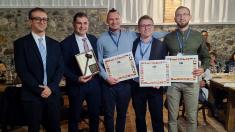 The winning team with diplomas. Michał Łepek, the WUT representative in the middle, to the right, the other competition team members – Bartłomiej Koszek and Mateusz Kaszyński