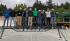 Photo of 10 people from The Science Club of Bridge Engineers who are standing on their bridge