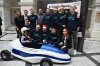 Maks with his parents and the constructors of the e-MaksPower vehicle, photo: WUT